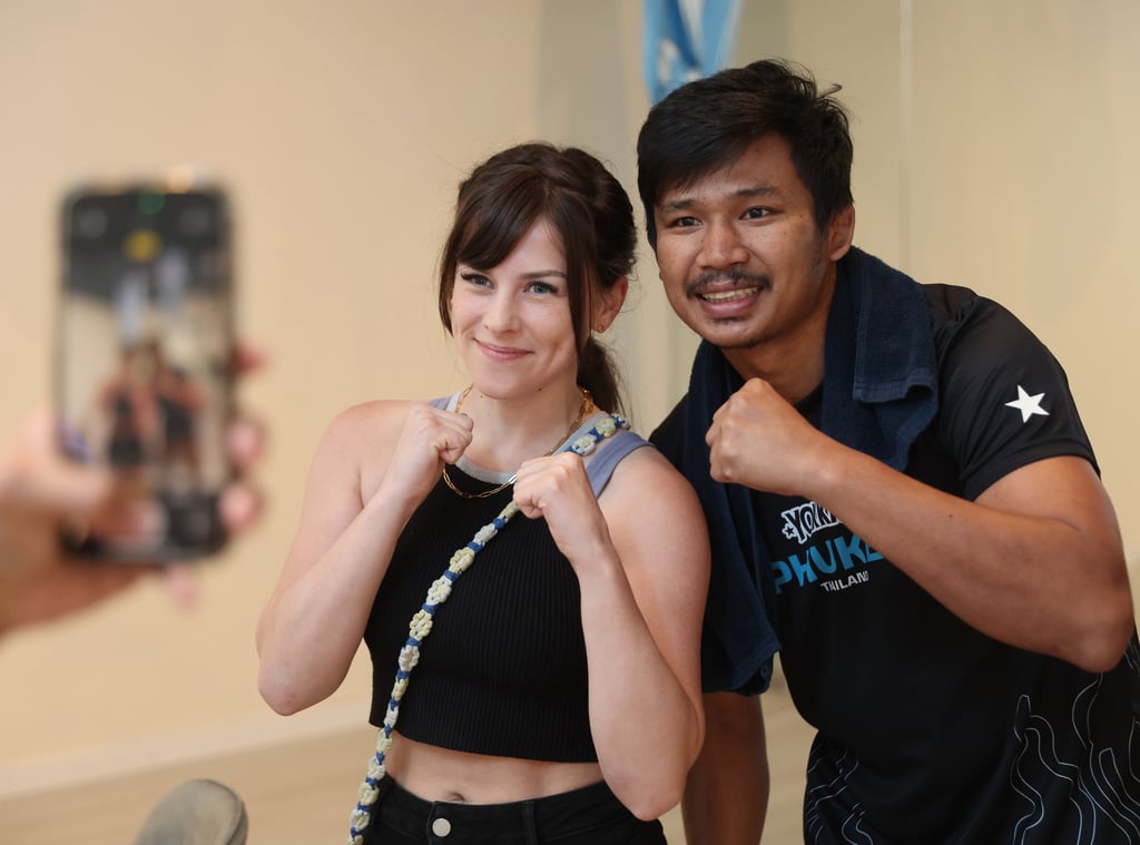 Superlek Kiatmoo9 poses for a picture with a fan at Tai Po Sports Association Li Fook Lam Indoor Sports Centre. Photo: Edmond So