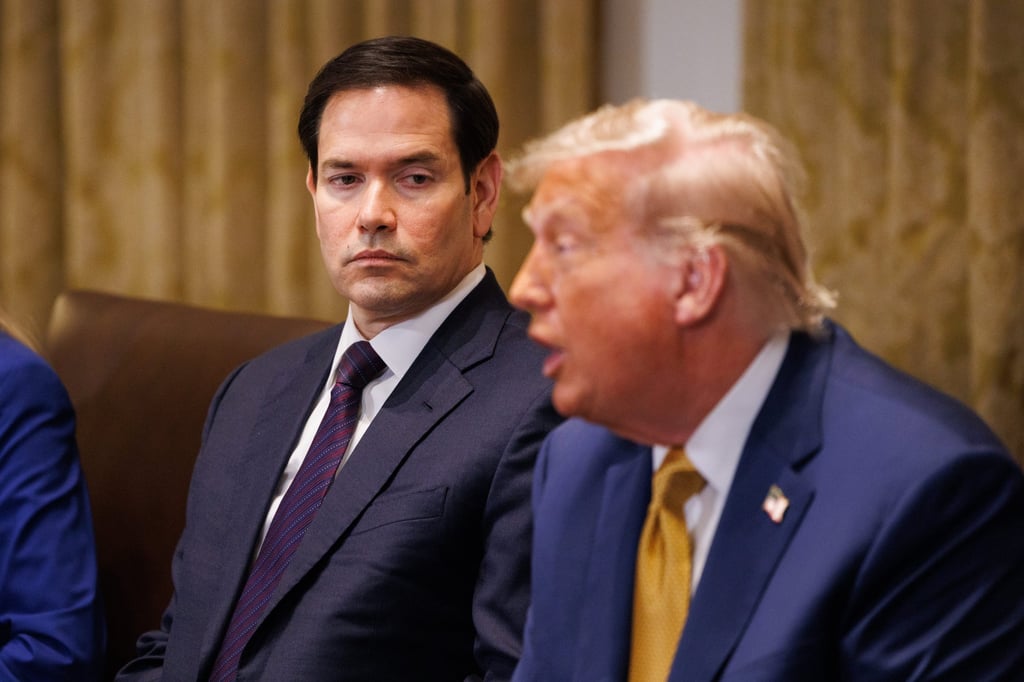 US Secretary of State Marco Rubio (left) looks on as President Donald Trump speaks at a cabinet meeting on Tuesday. Photo: EPA US Secretary of State Marco Rubio (left) looks on as President Donald Trump speaks at a cabinet meeting on Tuesday. Photo: EPA