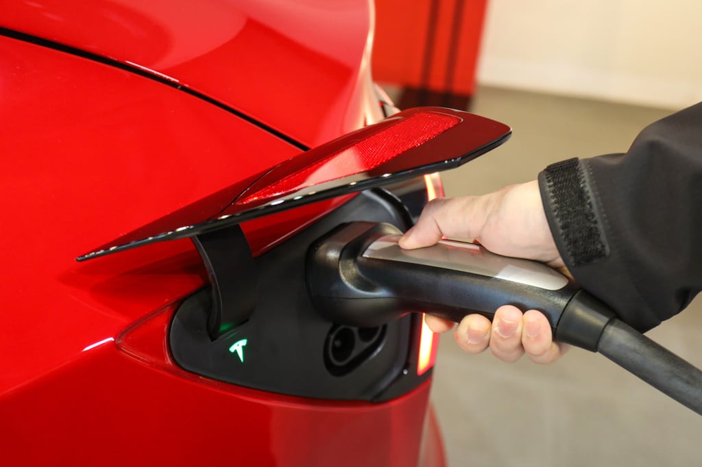 If the government’s new system is approved, a long-range Tesla Model 3 vehicle will be subject to an annual licence fee of HK$2,500 based on its power rating of 153 kilowatts from November 1. Photo: May Tse If the government’s new system is approved, a long-range Tesla Model 3 vehicle will be subject to an annual licence fee of HK$2,500 based on its power rating of 153 kilowatts from November 1. Photo: May Tse