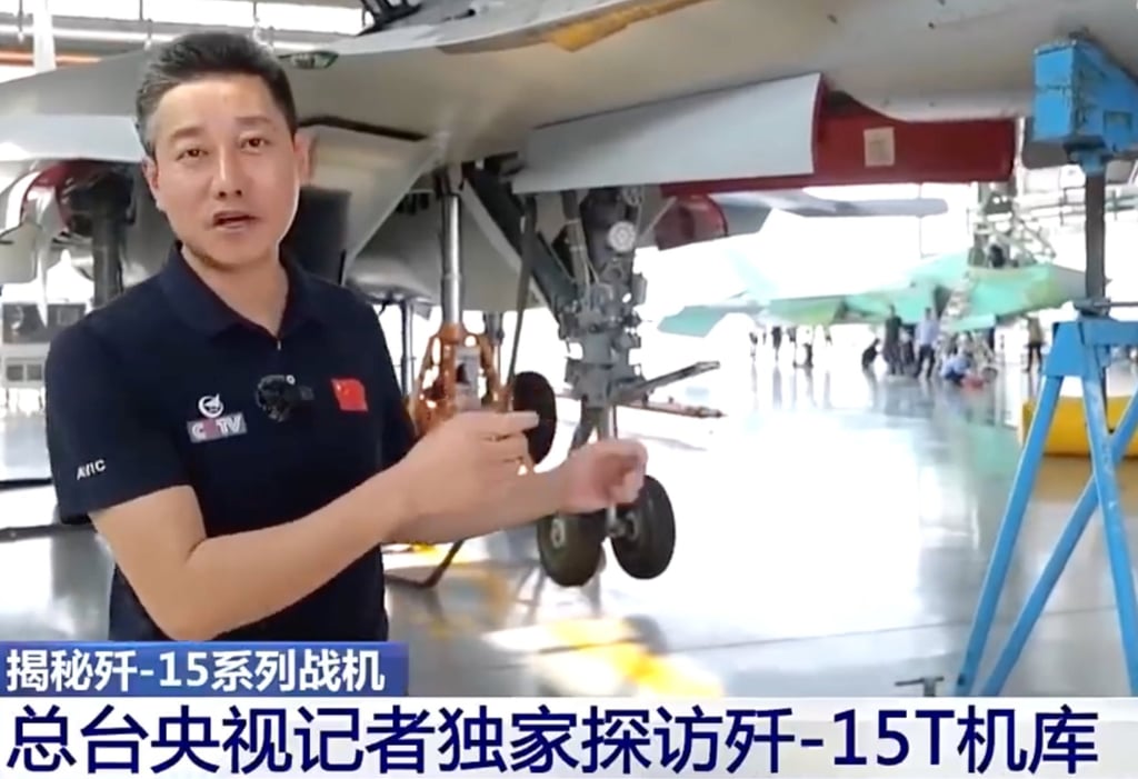 During a CCTV report on Tuesday, at least two J-35 fighter jets were spotted in a hangar of its developer, Shenyang Aircraft Corporation. The stealth aircraft, painted green, can be seen in the background. Photo: CCTV During a CCTV report on Tuesday, at least two J-35 fighter jets were spotted in a hangar of its developer, Shenyang Aircraft Corporation. The stealth aircraft, painted green, can be seen in the background. Photo: CCTV