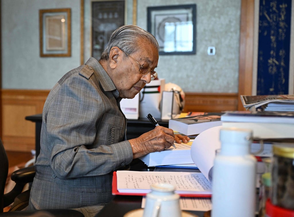 Malaysia’s former prime minister Mahathir Mohamad working at his office in Putrajaya on May 5. Photo: AFP Malaysia’s former prime minister Mahathir Mohamad working at his office in Putrajaya on May 5. Photo: AFP