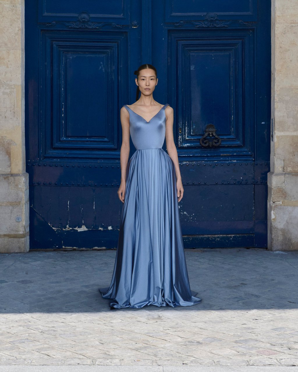 Liu Wen wears a blue evening gown from the Balenciaga haute couture collection. Photo: Handout
