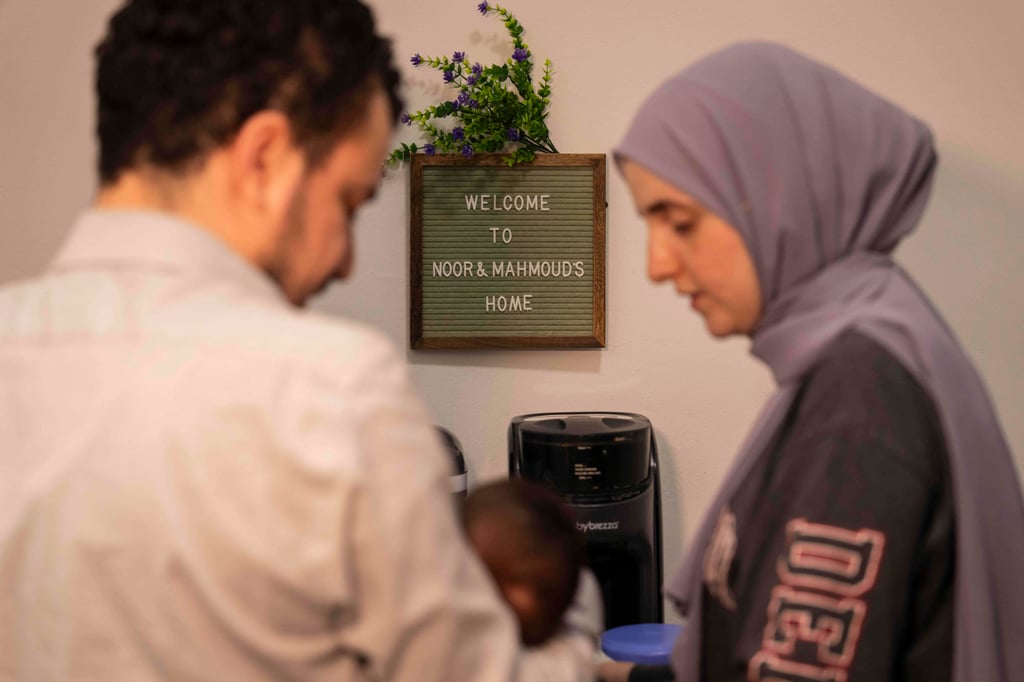 Mahmoud Khalil and his wife, Noor Abdalla, hold their baby during an interview in New York on July 3. Photo: AP Mahmoud Khalil and his wife, Noor Abdalla, hold their baby during an interview in New York on July 3. Photo: AP