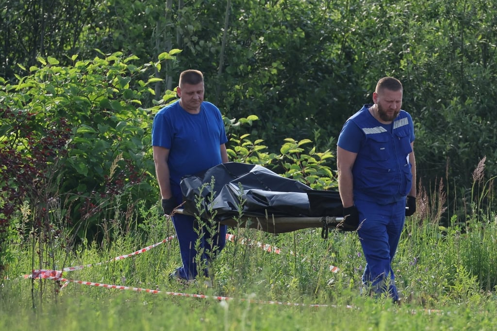 Roman Starovoyt’s body being carried from the place where his body was found. Photo: Tass via dpa Roman Starovoyt’s body being carried from the place where his body was found. Photo: Tass via dpa