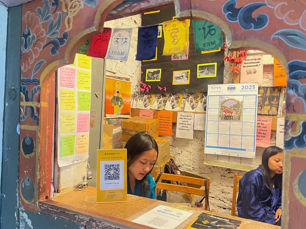 A QR code for cryptocurrency payments is seen in the ticketing office of Punakha Dzong in Bhutan. Photo: Bibek Bhandari
