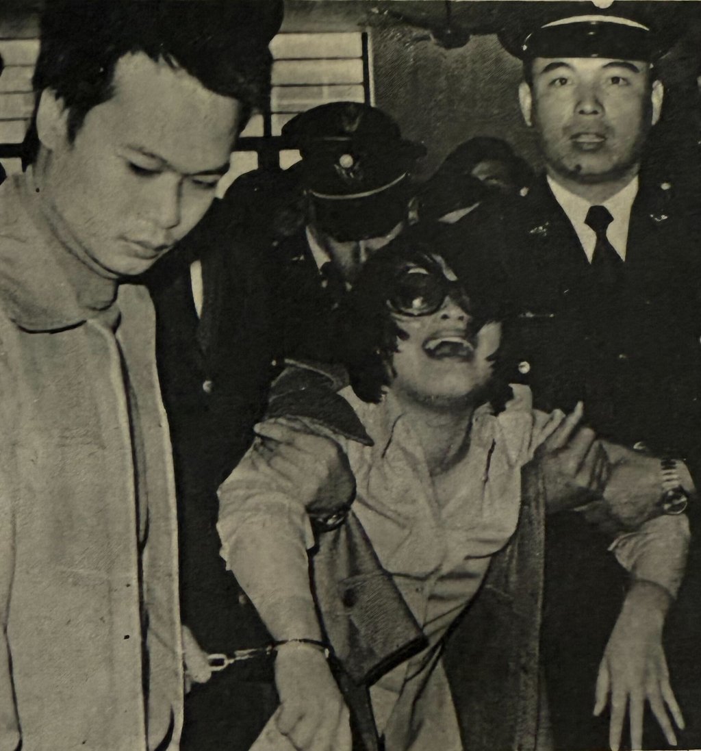Manacled to her bodyguard, weeping drug queen Yeung Yin-hing is dragged out of the courtroom at Taipei District Court by policemen after hearing her life sentence. Photo: SCMP Archives Manacled to her bodyguard, weeping drug queen Yeung Yin-hing is dragged out of the courtroom at Taipei District Court by policemen after hearing her life sentence. Photo: SCMP Archives