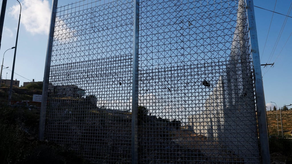 Part of a fence set by the Israeli authorities in Sinjil, near Ramallah, in the Israeli-occupied West Bank. Photo: Reuters Part of a fence set by the Israeli authorities in Sinjil, near Ramallah, in the Israeli-occupied West Bank. Photo: Reuters