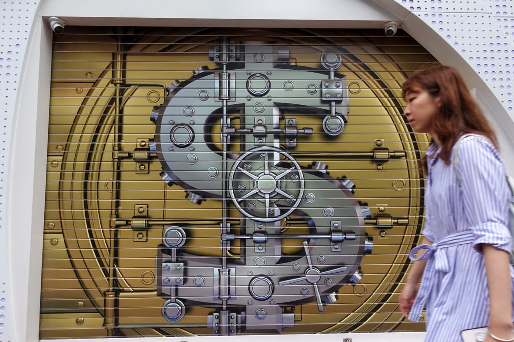 A currency exchange in Causeway Bay with a bank vault painted on its gate on May 5, 2024. Photo: Jelly Tse. A currency exchange in Causeway Bay with a bank vault painted on its gate on May 5, 2024. Photo: Jelly Tse.