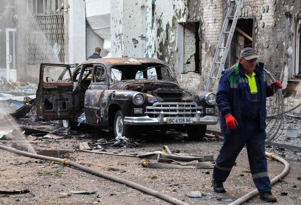 A burned car at the site of a drone strike on a residential building in Lviv, Ukraine on Saturday. Photo: EPA A burned car at the site of a drone strike on a residential building in Lviv, Ukraine on Saturday. Photo: EPA