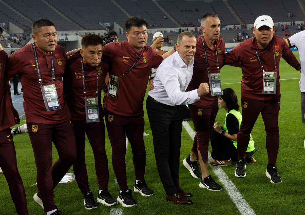 Dejan Djurdjevic issues final instructions before China’s loss to South Korea last Monday. Photo: Xinhua