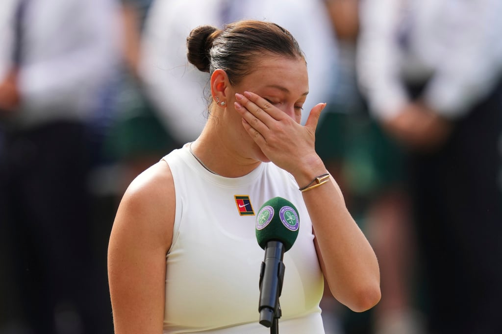 Amanda Anisimova of the US reacts after losing the women’s singles final match against Iga Swiatek of Poland at the Wimbledon Tennis Championships in London on Saturday. Photo: AP