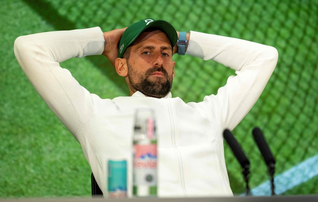 Novak Djokovic talks to the media after being beaten by Jannik Sinner in their semi-final. Photo: AFP Novak Djokovic talks to the media after being beaten by Jannik Sinner in their semi-final. Photo: AFP