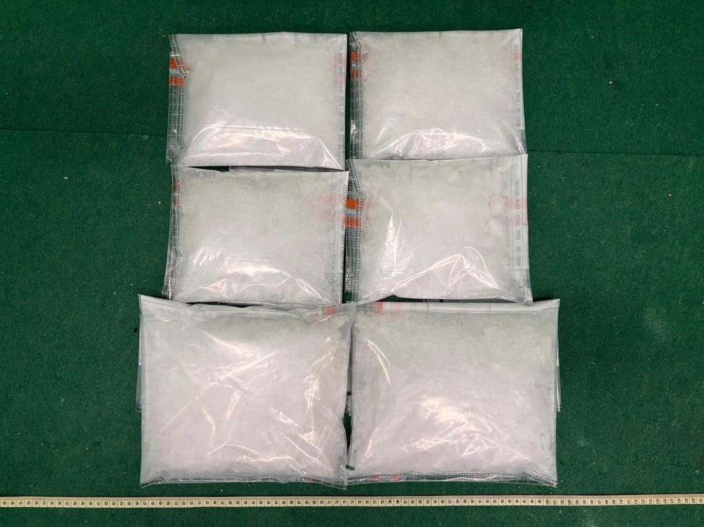 Officers found about 4kg of suspected “Ice” in a carry-on bag. Photo: Handout Officers found about 4kg of suspected “Ice” in a carry-on bag. Photo: Handout