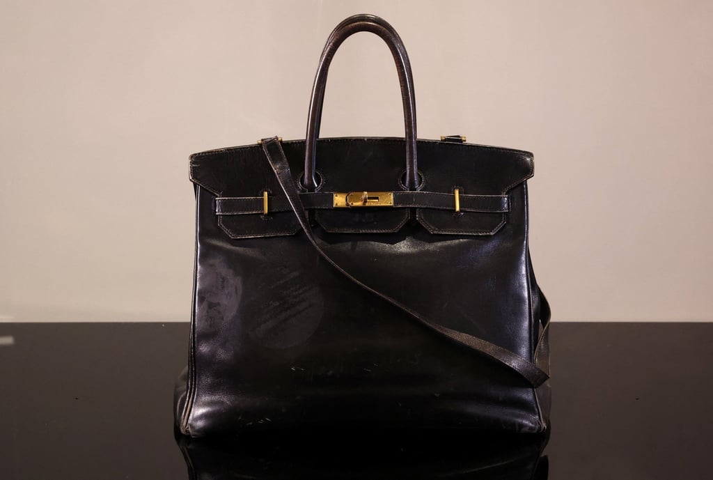 The original Birkin – the handbag created by Hermès for actress Jane Birkin and offered to her in 1985 – displayed during a July 2 preview, ahead of Sotheby’s Fashion Icons sale in Paris. Photo: Reuters