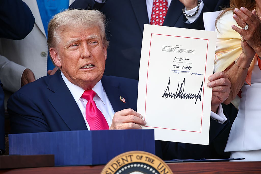 US President Donald Trump signs the One, Big Beautiful Bill Act into law on July 4 in Washington. Photo: TNS US President Donald Trump signs the One, Big Beautiful Bill Act into law on July 4 in Washington. Photo: TNS