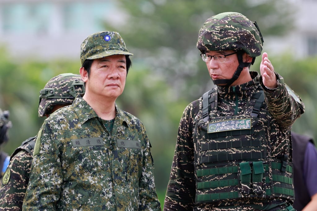William Lai (left) observes a drill at a naval base in Kaohsiung on Monday, part of the annual Han Kuang military exercise. Photo: EPA William Lai (left) observes a drill at a naval base in Kaohsiung on Monday, part of the annual Han Kuang military exercise. Photo: EPA