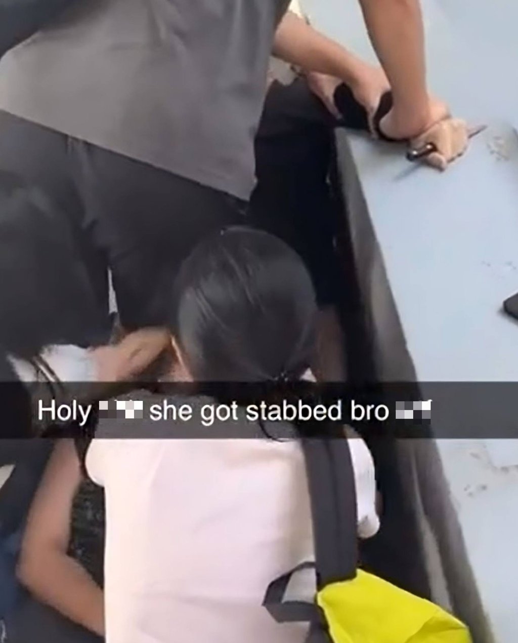 A screengrab of a social media video shows the suspect, a Chinese national, being restrained as friends try to help the victim following a knife attack at Taylor’s University in Malaysia on Monday. Photo: Reddit A screengrab of a social media video shows the suspect, a Chinese national, being restrained as friends try to help the victim following a knife attack at Taylor’s University in Malaysia on Monday. Photo: Reddit