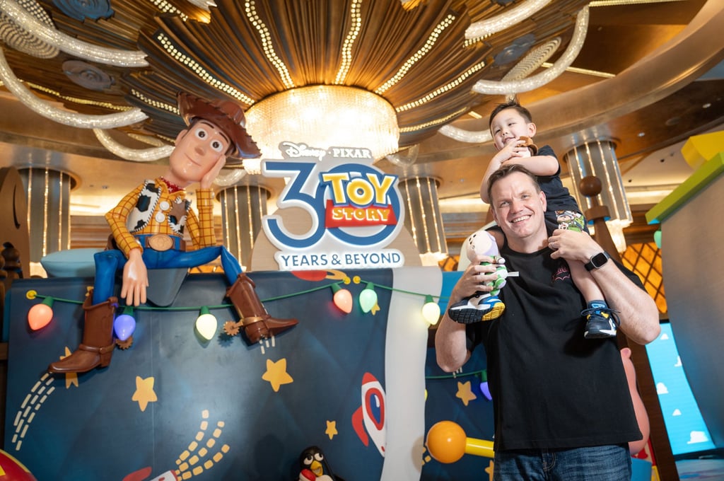 Kevin Benning, senior vice-president and property general manager of Studio City, and his 2-year-old son at the Toy Story attraction at the hotel. Photo: Handout Kevin Benning, senior vice-president and property general manager of Studio City, and his 2-year-old son at the Toy Story attraction at the hotel. Photo: Handout