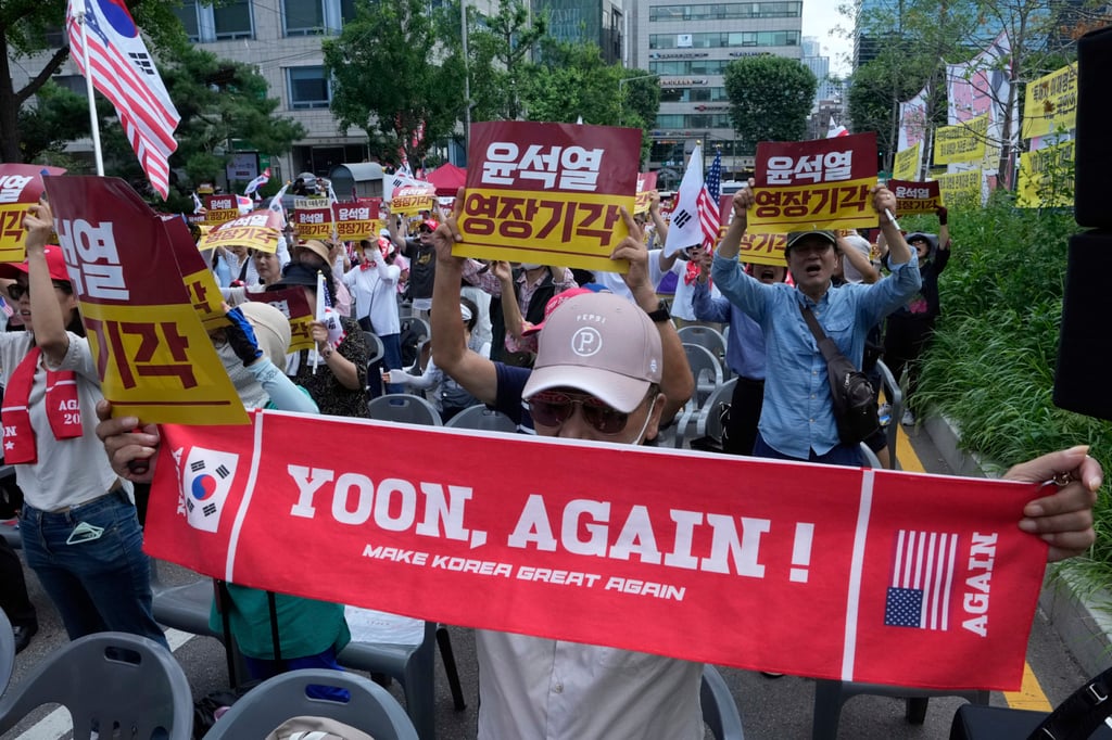 Supporters of Yoon stage a rally in solidarity with the South Korean ex-president near Seoul Central District Court on July 9. Photo: AP Supporters of Yoon stage a rally in solidarity with the South Korean ex-president near Seoul Central District Court on July 9. Photo: AP