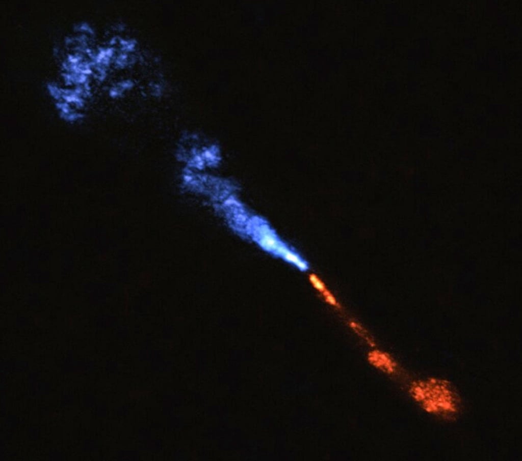 Jets of silicon monoxide are seen blowing away from the baby star HOPS-315. Photo: AP