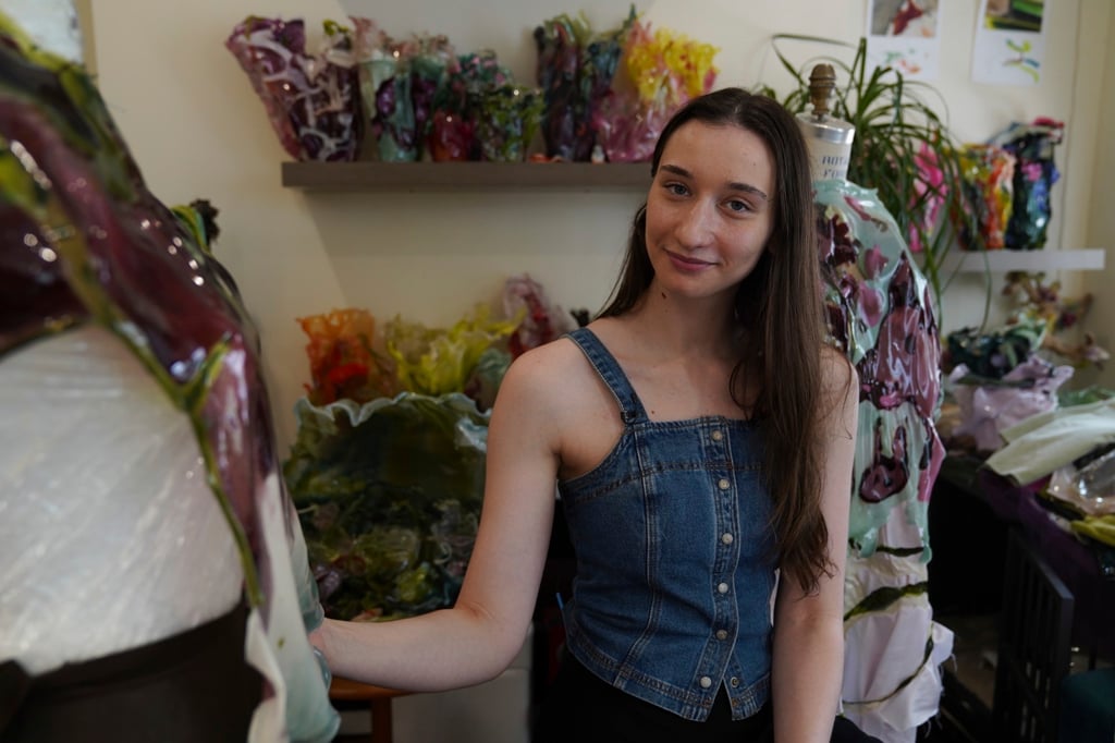 Fashion designer Caroline Zimbalist poses in her studio in New York. Photo: AP