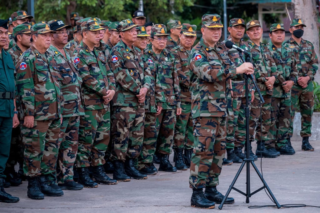 Hun Manet (foreground) delivers a speech in front of Cambodian troops during a visit to Preah Vihear, near the Cambodia-Thailand border, on June 23. Photo: Agence Kampuchea Press/AP