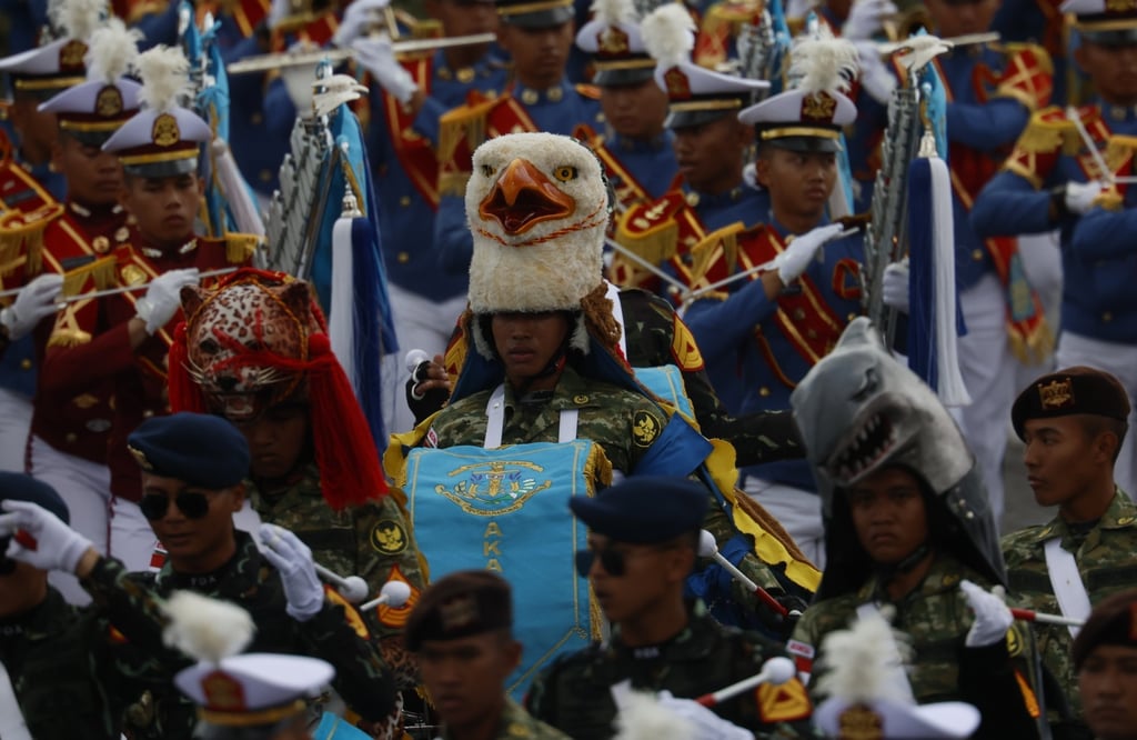 The Indonesian army parade during the Bastille day celebrations in Paris on Monday. Photo: EPA The Indonesian army parade during the Bastille day celebrations in Paris on Monday. Photo: EPA