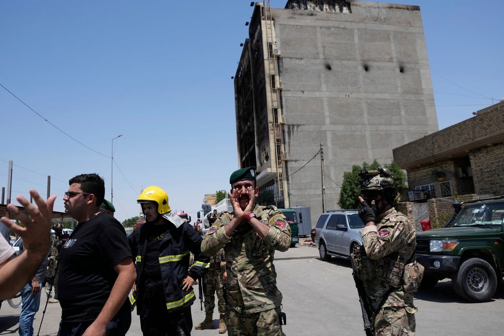 Iraqi security forces at the scene. Photo: AP Iraqi security forces at the scene. Photo: AP