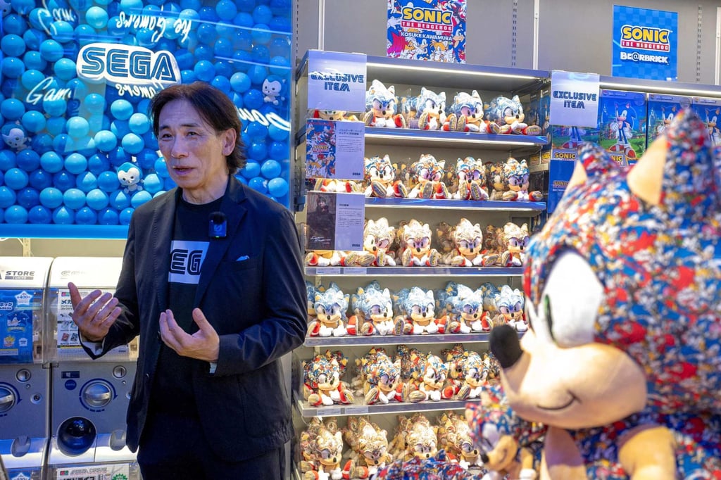 Shuji Utsumi, president and COO of Sega, speaks at the opening ceremony of the company’s first flagship merchandise store in Japan, in Tokyo’s Shibuya district, on July 16, 2025. Photo: AFP
