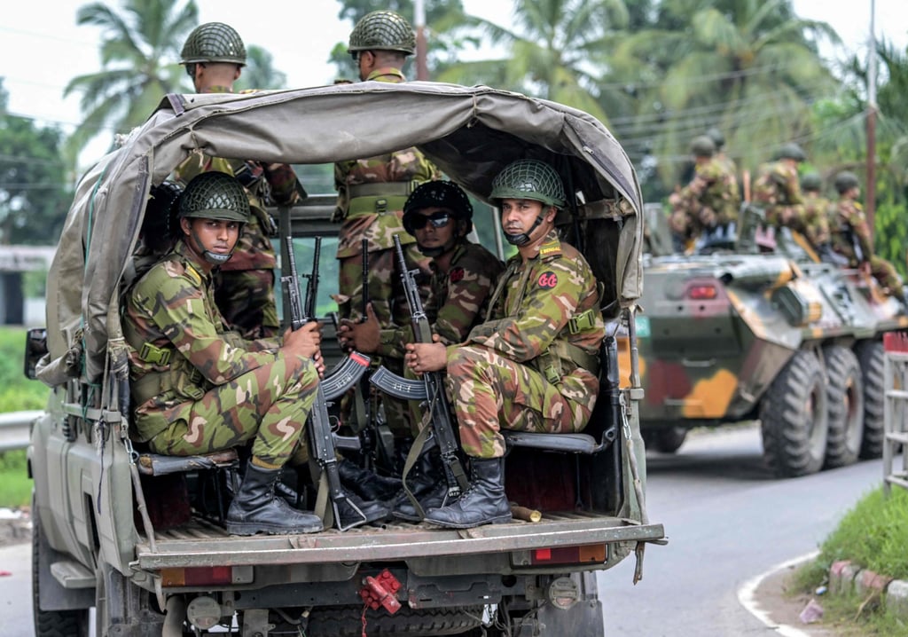 Bangladesh’s army personnel patrol a street in Gopalganj on Thursday. Photo: AFP Bangladesh’s army personnel patrol a street in Gopalganj on Thursday. Photo: AFP