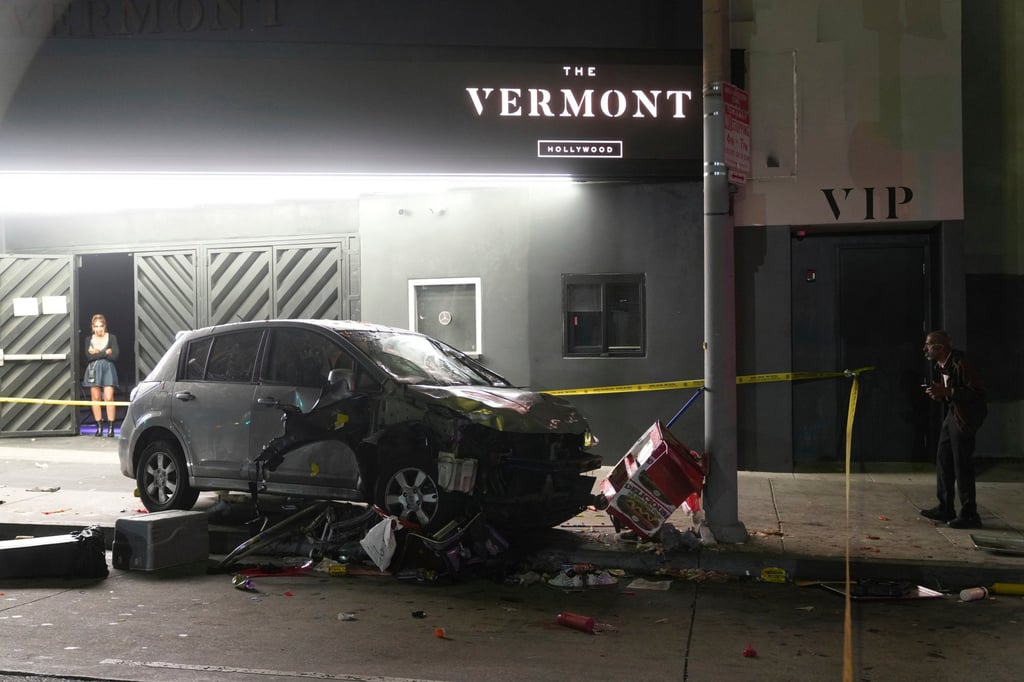 A vehicle sits on the pavement after ramming into a crowd of people in Los Angeles early on Saturday. Photo: AP