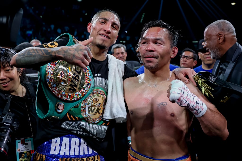 Manny Pacquiao (right) alongside Mario Barrios after their WBC Welterweight Championship bout at the MGM Grand Garden Arena. Photo: EPA