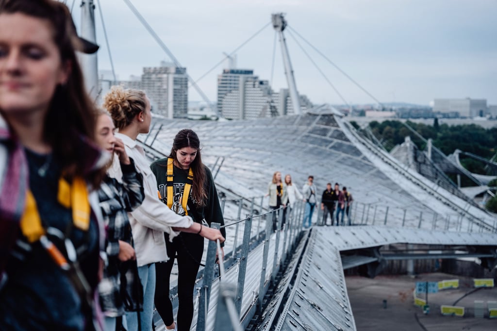 Visitors walk on the roof of Munich’s Olympiastadion. Photo: Olympiapark München GmbH/dpa Visitors walk on the roof of Munich’s Olympiastadion. Photo: Olympiapark München GmbH/dpa