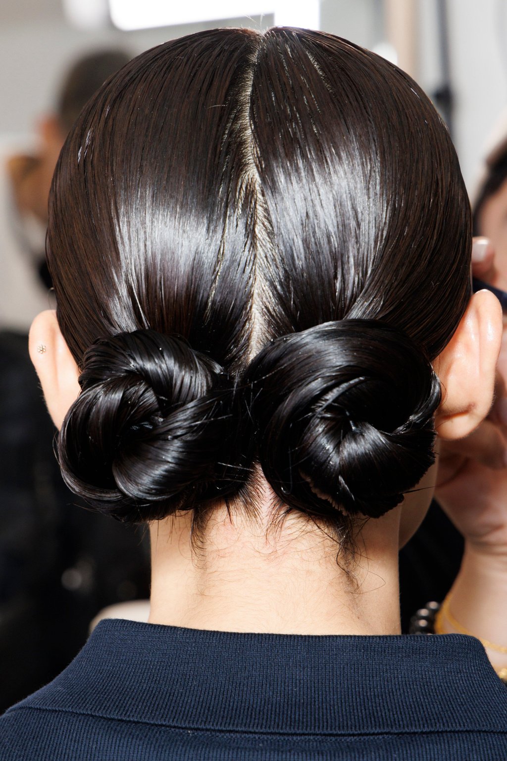 Chic double buns worn by a model at the Max Mara fashion show during the Milan womenswear spring/summer 2025 show in Milan, Italy. Photo: Getty Images Chic double buns worn by a model at the Max Mara fashion show during the Milan womenswear spring/summer 2025 show in Milan, Italy. Photo: Getty Images