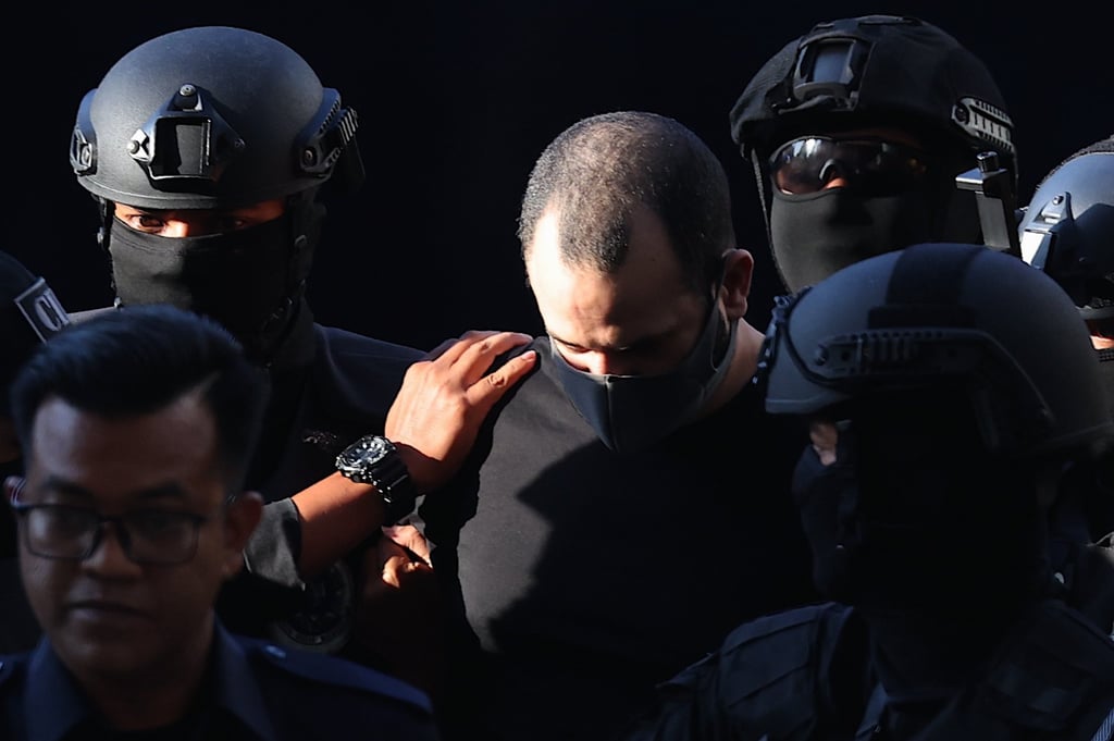 Israeli Shalom Avitan (centre) being escorted by Royal Malaysia Police officers to Kuala Lumpur Sessions Court on April 12, 2024. Avitan was sentenced to seven years’ jail in February. Photo: EPA-EFE Israeli Shalom Avitan (centre) being escorted by Royal Malaysia Police officers to Kuala Lumpur Sessions Court on April 12, 2024. Avitan was sentenced to seven years’ jail in February. Photo: EPA-EFE