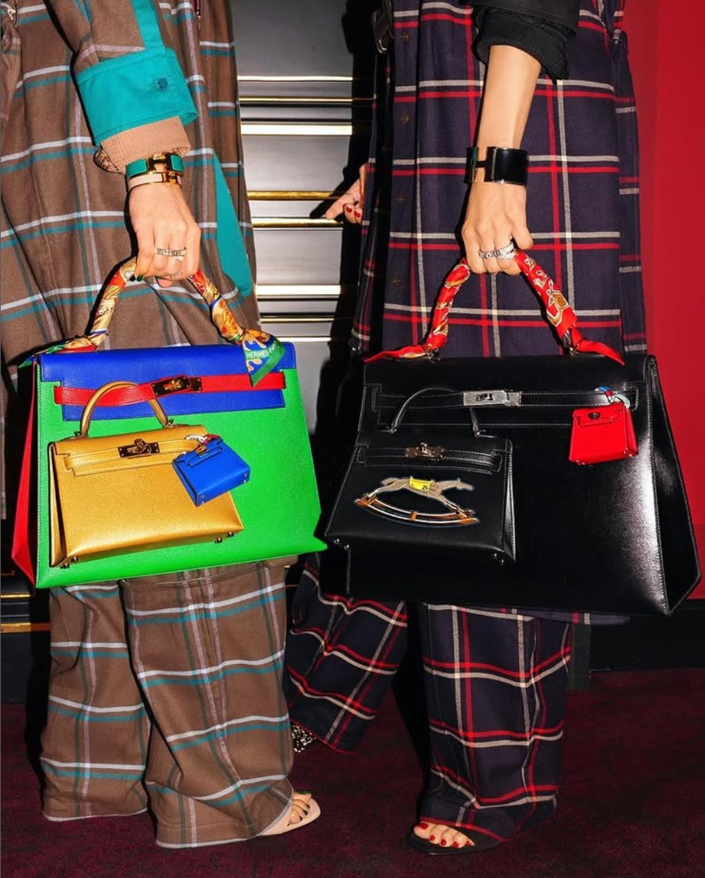 Snejyo holding Hermès Kelly bags that are in turn accessorised with mini and micro Kelly bags. Photo: @snejyo/Instagram