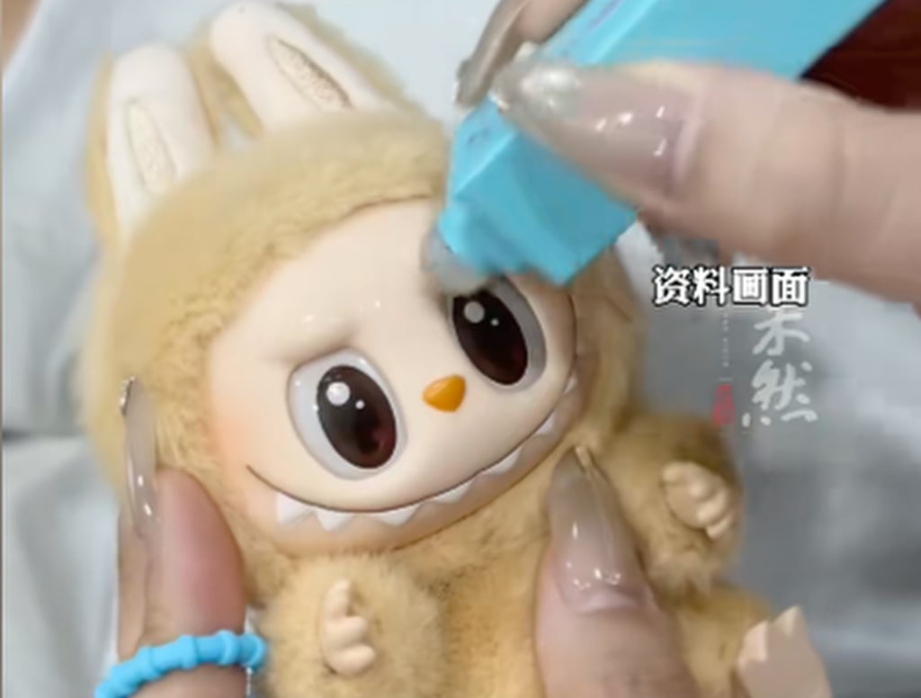 Under repair: A “toy doctor” sets about fixing one of the hugely popular creations. Photo: Douyin Under repair: A “toy doctor” sets about fixing one of the hugely popular creations. Photo: Douyin