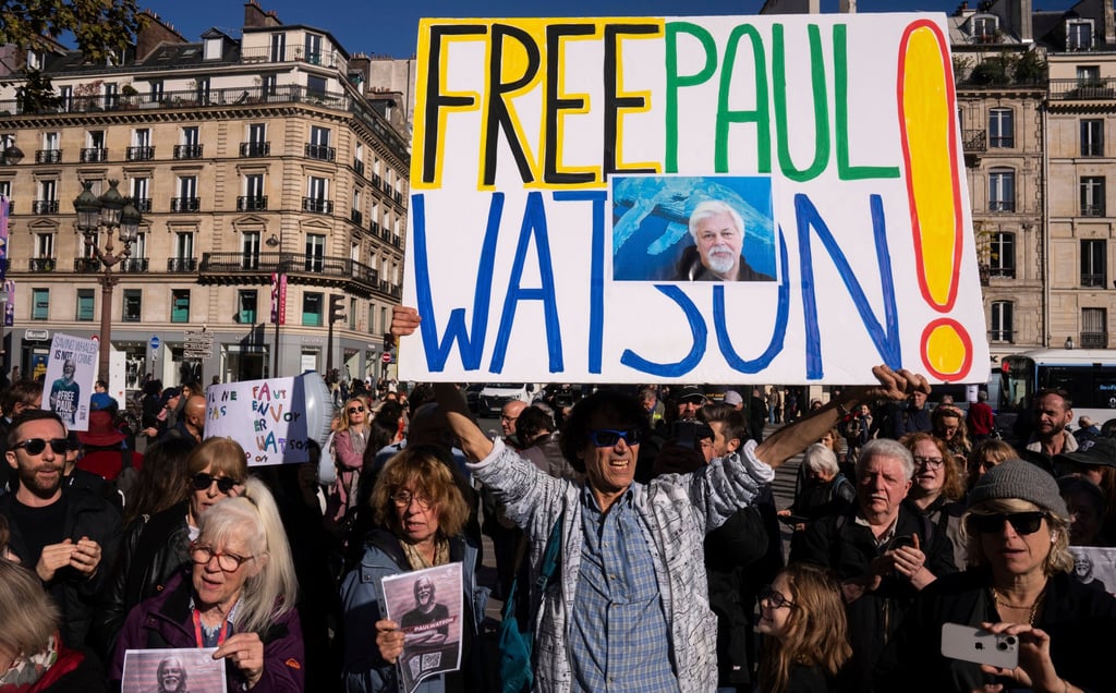 People demonstrate in Paris last October to support Paul Watson, who was asking France’s president for political asylum. Photo: AP