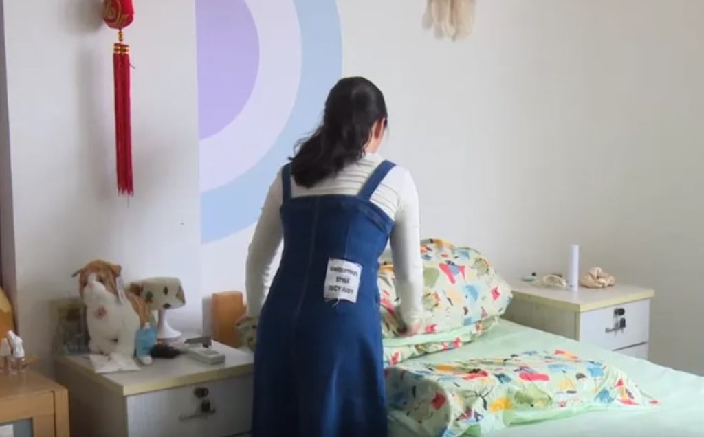 Liang, now 23, has lived at the Yangpu District rescue centre in Shanghai for nine years, following the death of her father and the disappearance of her mother. Photo: shobserver.com