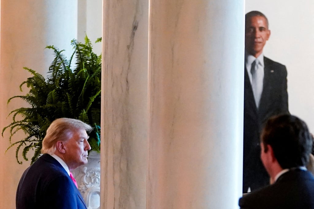 US President Donald Trump and a portrait of former president Barack Obama at the White House. Photo: Reuters