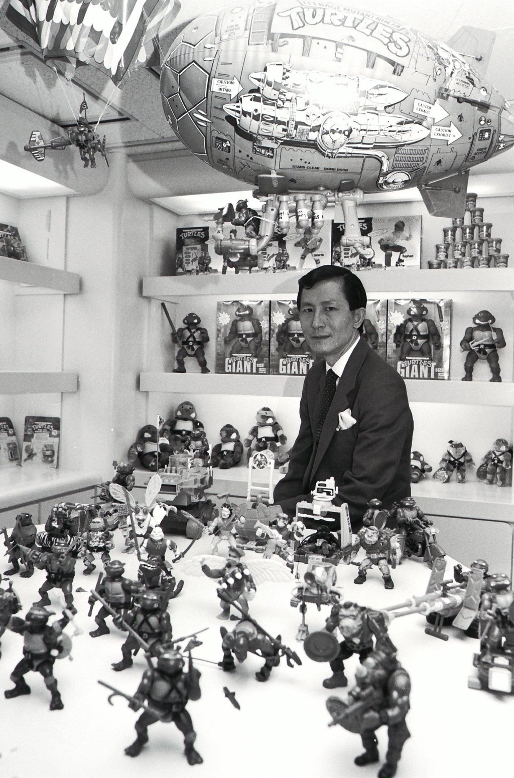 Paul Kwan, joint managing director of toymaker Playmates Holdings, with the company’s biggest hit, Teenage Mutant Ninja Turtle toys, in 1989. Photo: SCMP Archives