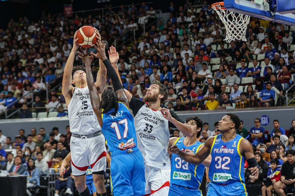 Hong Kong’s men’s basketball team (in white) could be prevented from competing. Photo: Xinhua