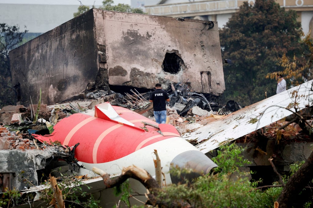 A firefighter stands next to the crashed Air India Boeing 787-8 Dreamliner aircraft in Ahmedabad, India, on June 13. Photo: Reuters