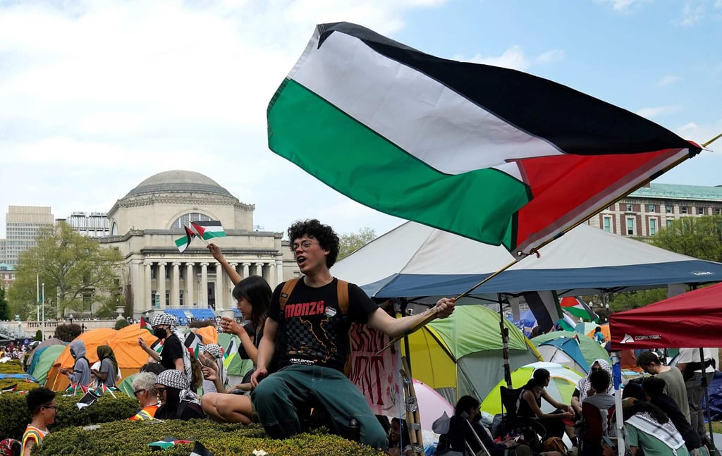 Protesters wave Palestinian flags at Columbia University in 2024. File photo: AFP Protesters wave Palestinian flags at Columbia University in 2024. File photo: AFP