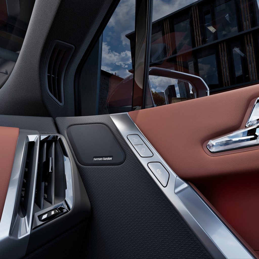 High-spec speakers in the doors are sited next to controls for the locks and seat belt. Photo: Handout