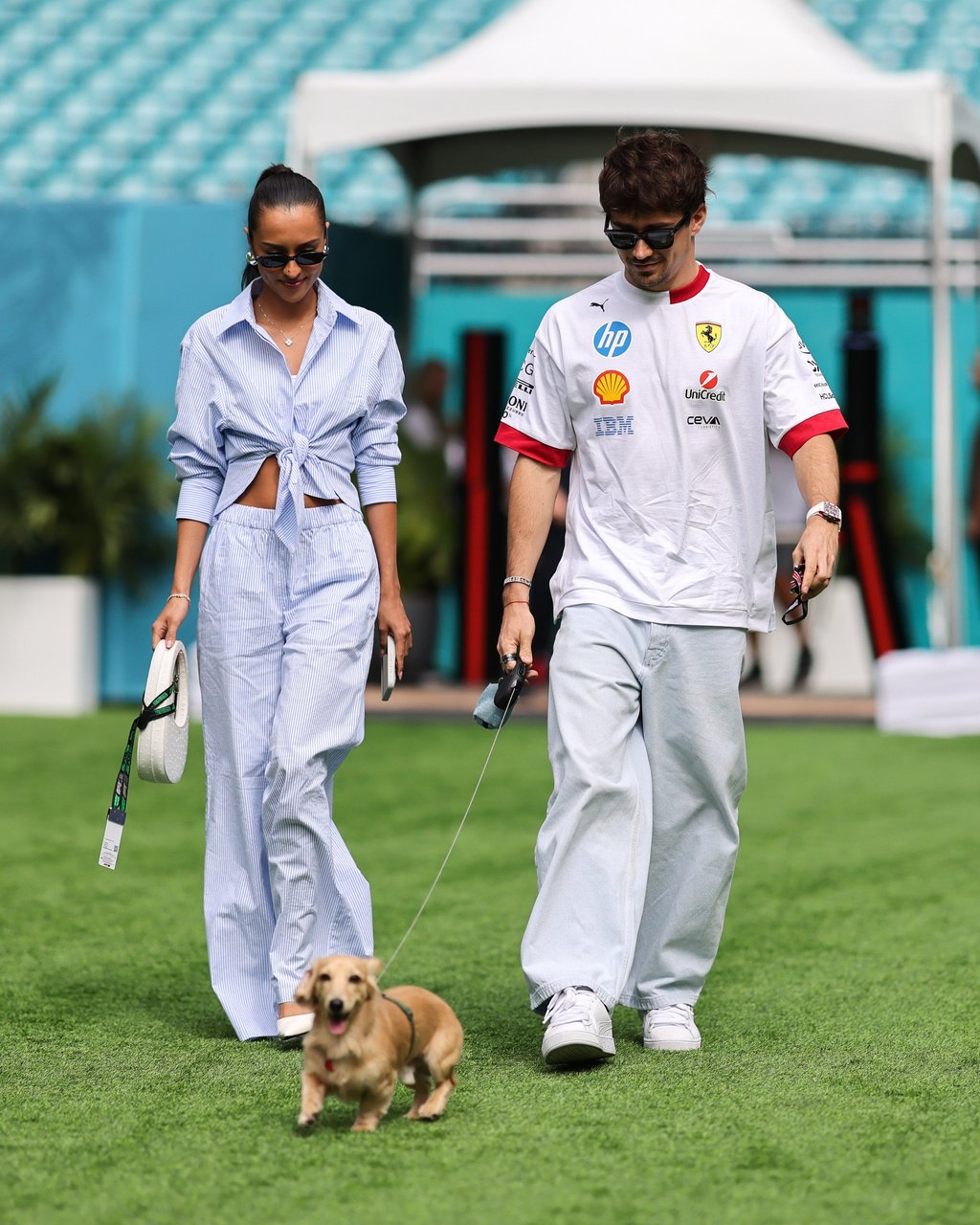 Ferrari Formula One driver Charles Leclerc arrives at Miami International Autodrome in Miami, Florida, in May with girlfriend Alexandra Saint Mleux and their dog Leo. Photo: NurPhoto via Getty Images