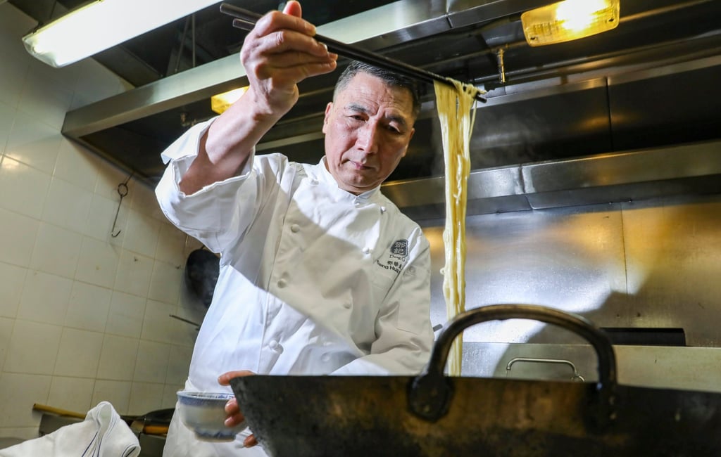 Chef Deng Hua-dong, Master Chef at Deng G, making dan dan noodles at his restaurant. Photo: Nora Tam Chef Deng Hua-dong, Master Chef at Deng G, making dan dan noodles at his restaurant. Photo: Nora Tam