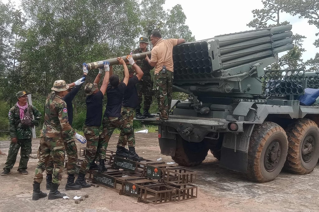 Cambodian soldiers reload a BM-21 multiple rocket launcher in Preah Vihear province on Thursday. Photo: AFP
