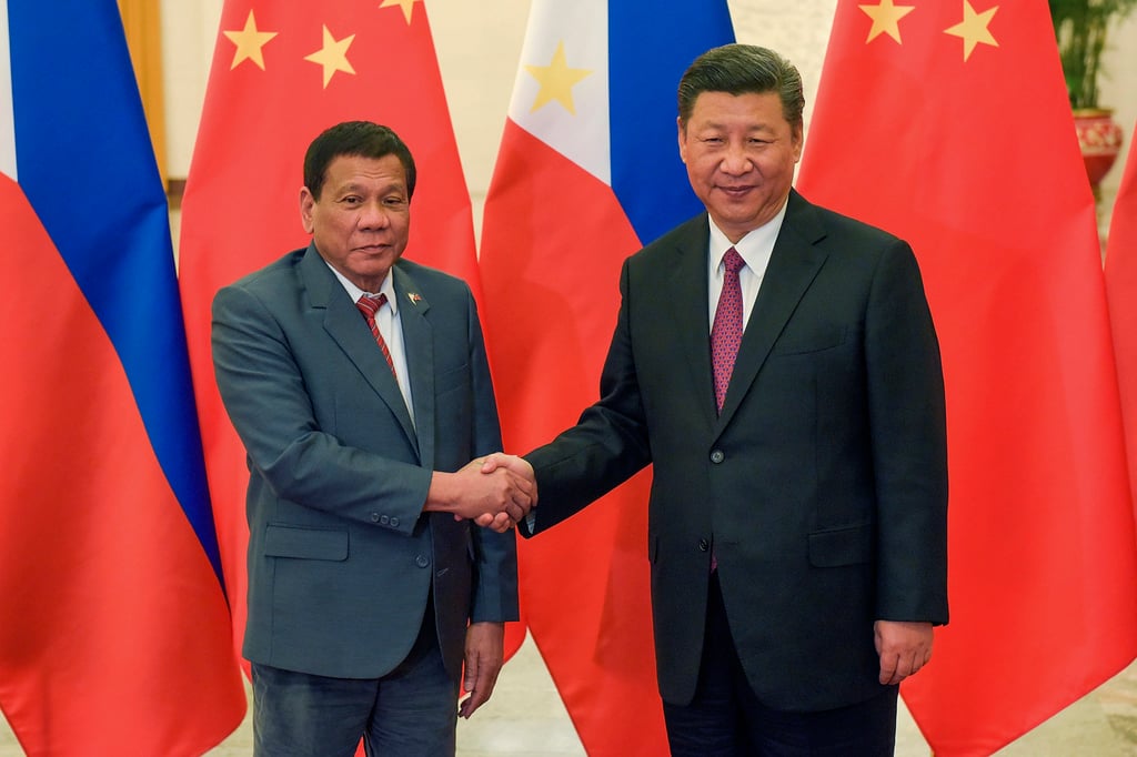 Philippine President Rodrigo Duterte (left) and his Chinese counterpart Xi Jinping in Beijing in 2017. Duterte pursued closer ties with Beijing through a wave of high-profile infrastructure agreements. Photo: AP Philippine President Rodrigo Duterte (left) and his Chinese counterpart Xi Jinping in Beijing in 2017. Duterte pursued closer ties with Beijing through a wave of high-profile infrastructure agreements. Photo: AP