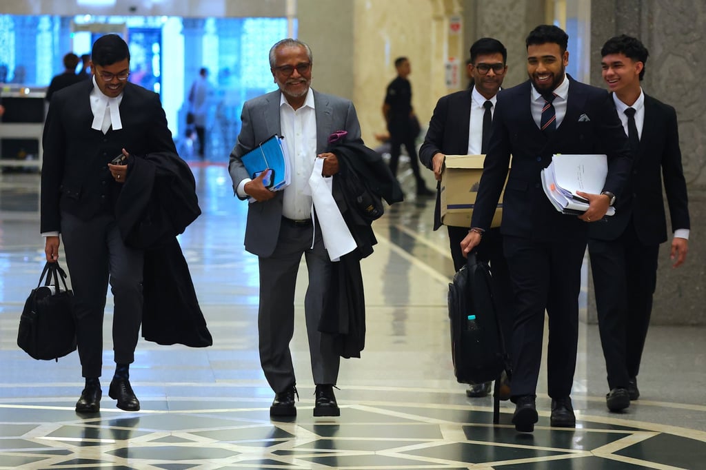 Shafee Abdullah (second from left) and the rest of Najib Razak’s legal team arrive at the Malaysian attorney general’s office on July 1 to appeal about the existence of the royal decree. Photo: EPA Shafee Abdullah (second from left) and the rest of Najib Razak’s legal team arrive at the Malaysian attorney general’s office on July 1 to appeal about the existence of the royal decree. Photo: EPA